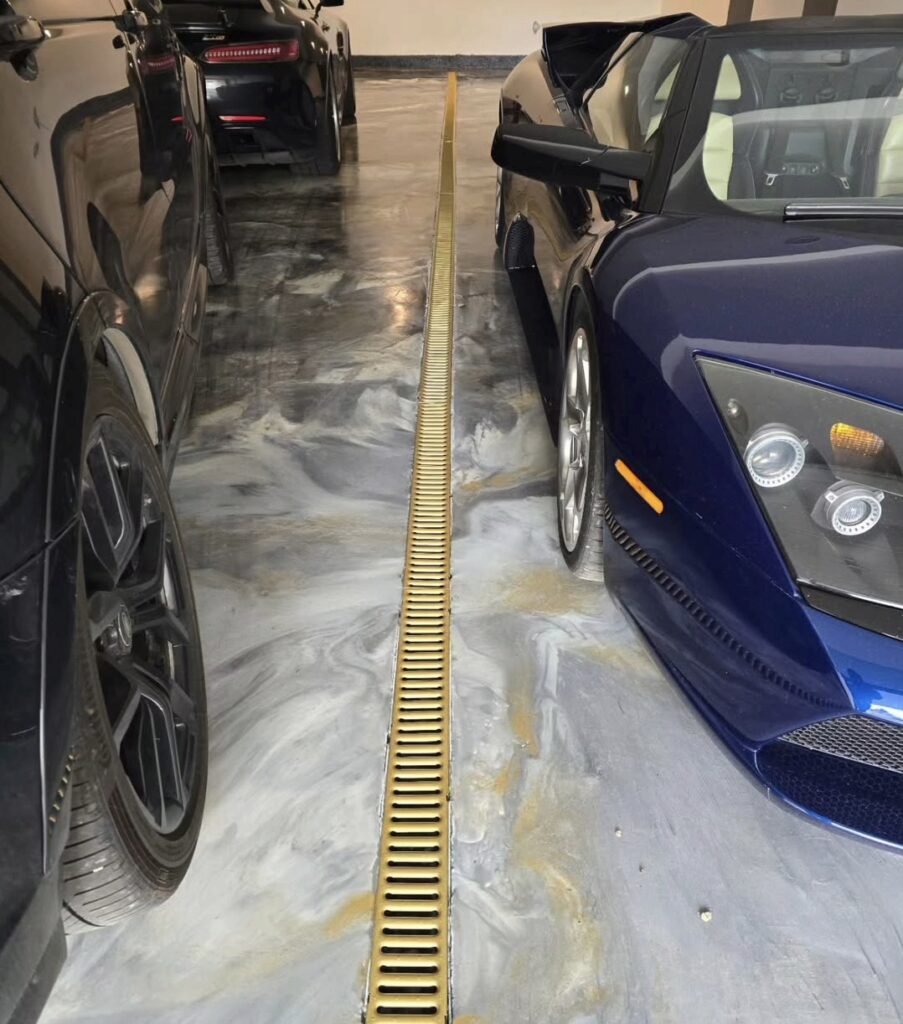 Reflective high-gloss metallic epoxy garage floor coating on Vancouver Island.